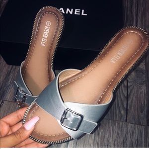 Silver buckled sandals